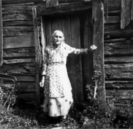 Florence Shiflett in front of her cabin